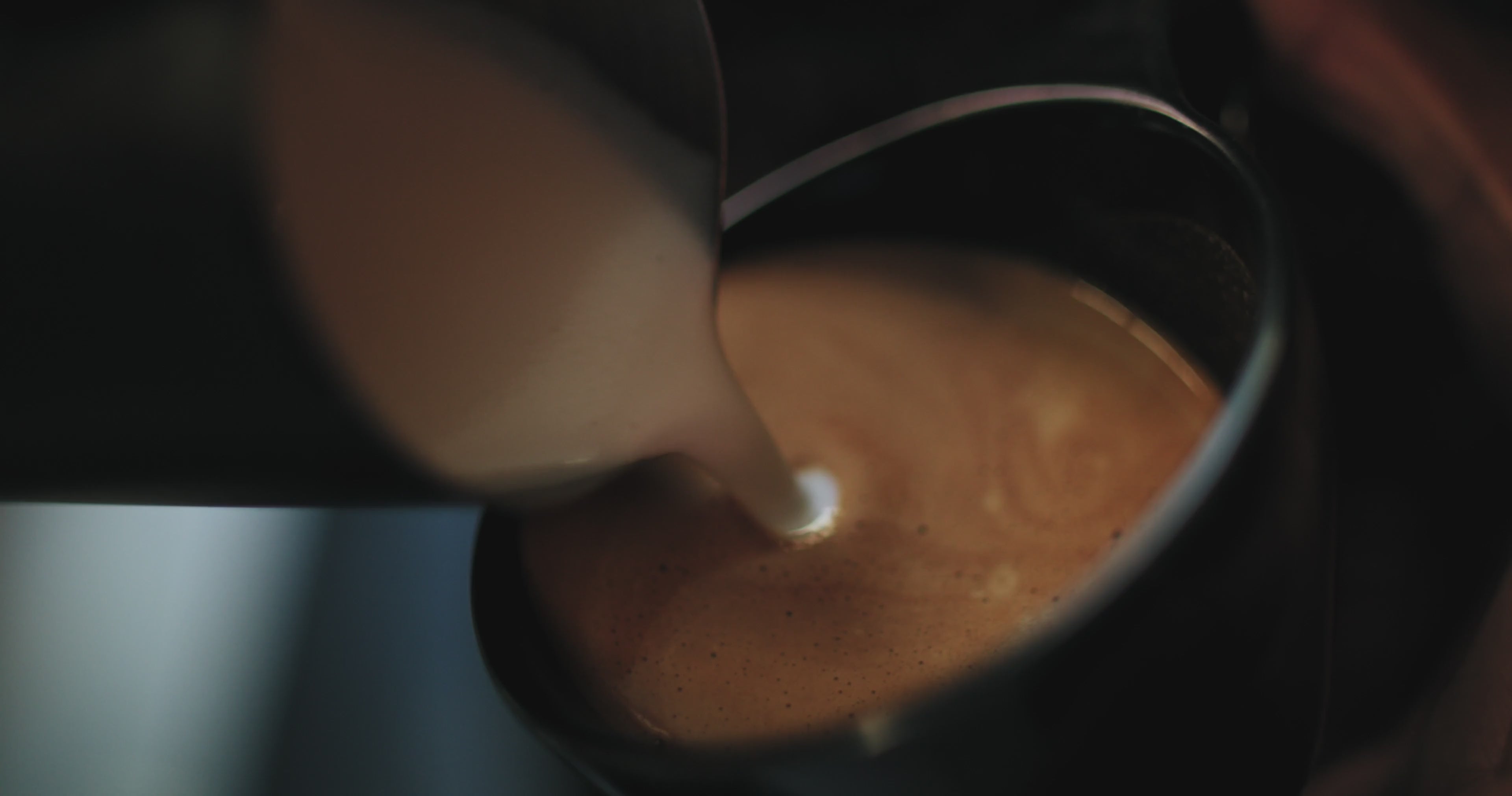 a beautiful cup of coffee being poured
